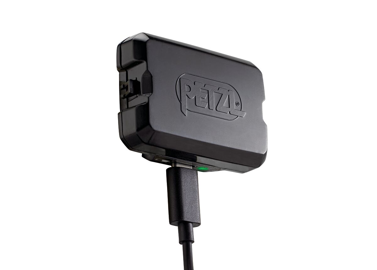 Petzl R2250 Rechargeable battery for SWIFT RL and SWIFT RL CLASSIC Headlamps, rechargabel headtorch battery, black battery case plugged in