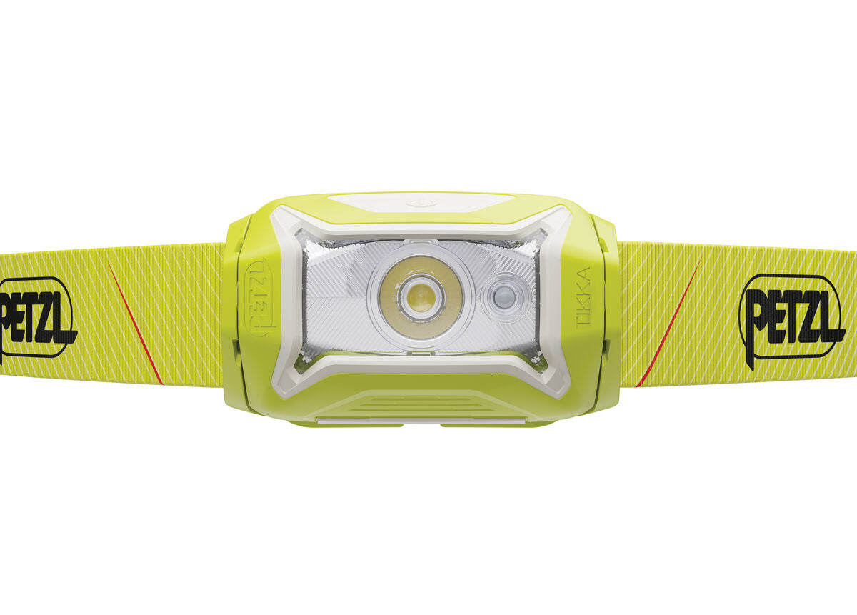 Yellow headlamp with Petzl logo on a white background