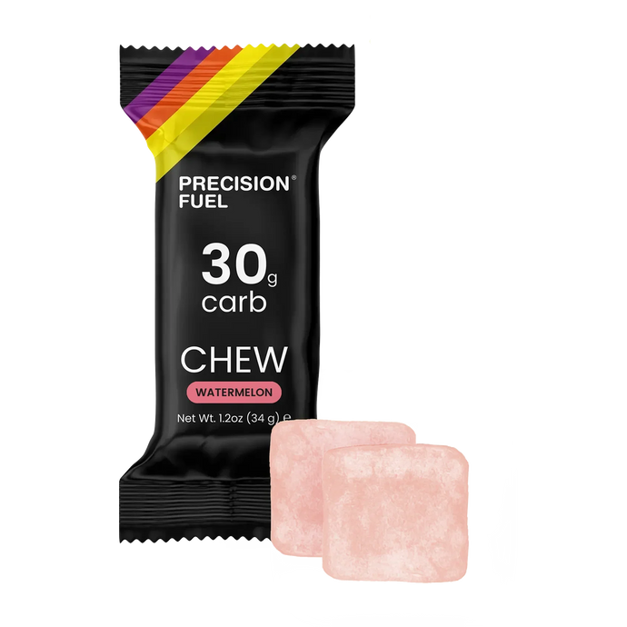 Black Precision Fuel Chew bar package  with two pink watermelon flavoured chew cubes, 30 grams of carbs, running nutrition