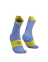 Pair of blue and yellow running socks  