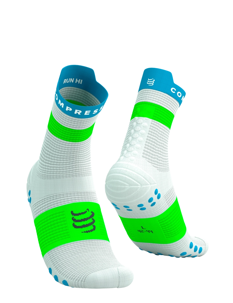 White running socks with green and blue accents 