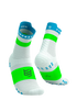 White running socks with green and blue accents 