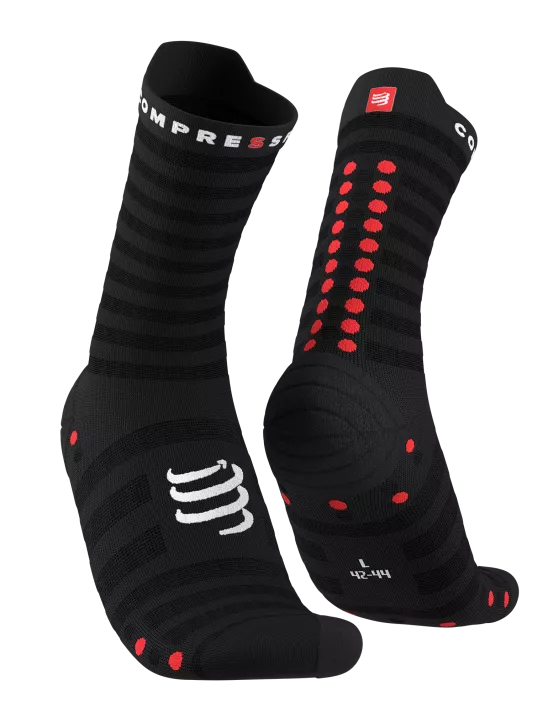 compressport pro racing ultralight run high quarter sock in black with red dots. Front on view of both socks.