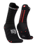 compressport pro racing ultralight run high quarter sock in black with red dots. Front on view of both socks.