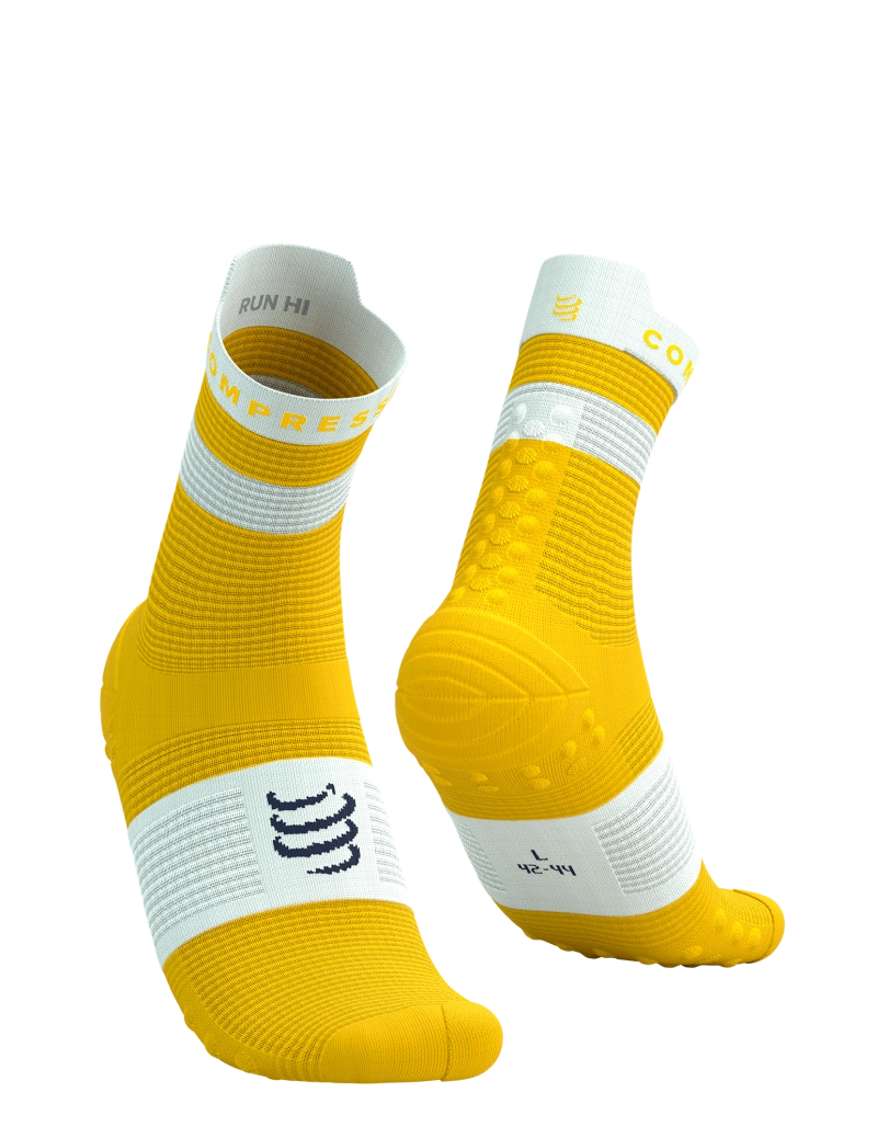 Compressport Pro Racing Socks V4.0 Run Quarter, breathable running sock with blister protection and compression, yellow and white, pair of socks one showing the front and one showing the heel 