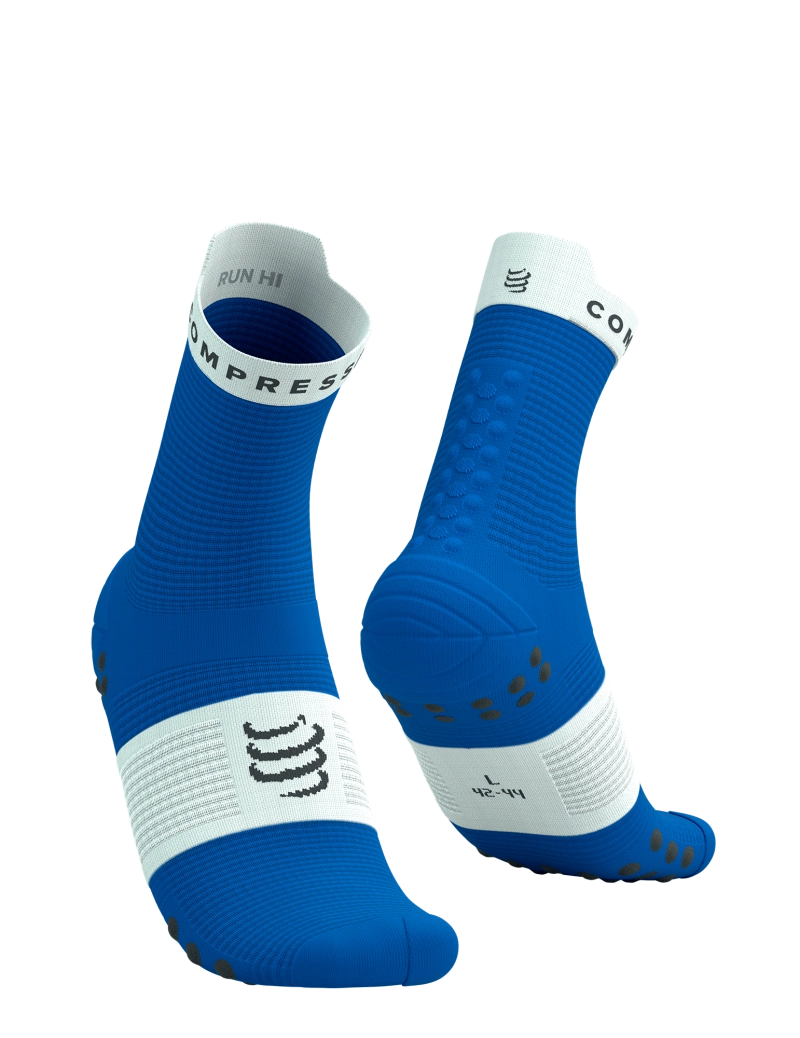 Compressport Pro Racing Socks V4.0 Run Quarter, breathable running sock with blister protection and compression, royal blue and white, pair of socks one showing the front and one showing the heel 