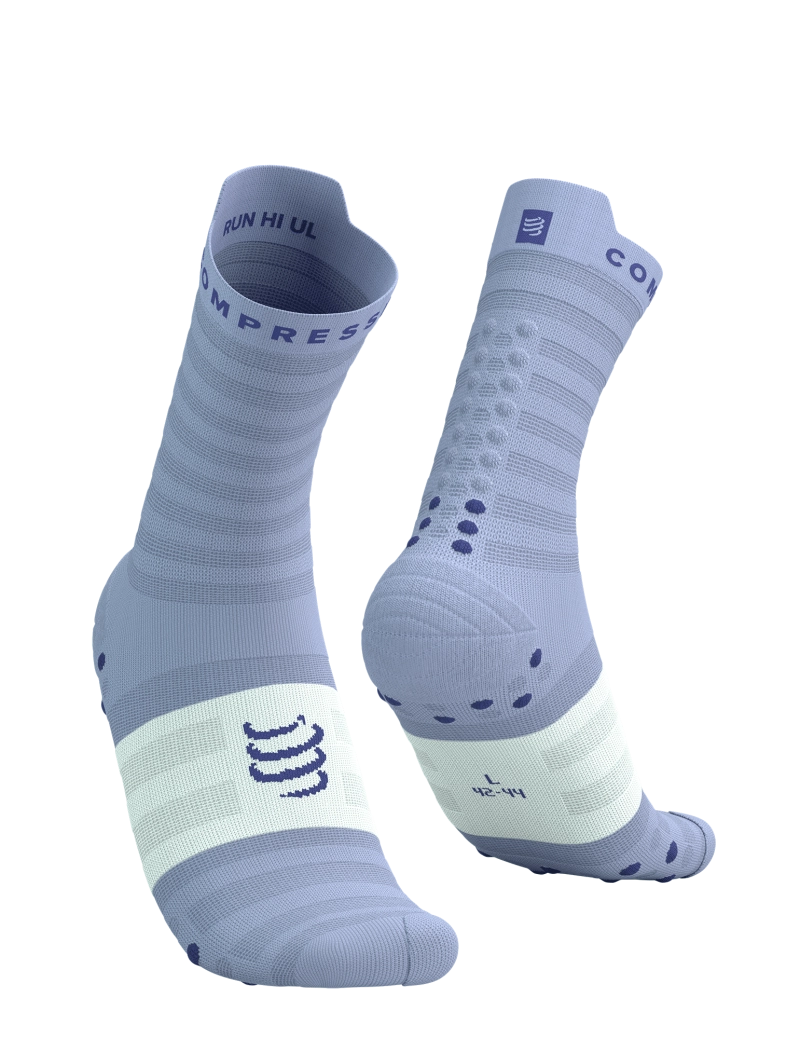 compressport pro racing ultralight run high quarter sock in light lavender and white colour. side view.
