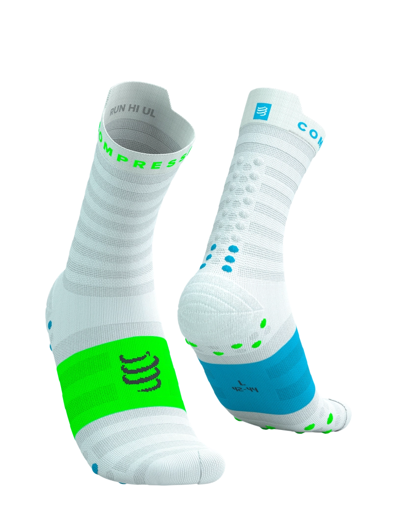 compressport pro racing ultralight run high quarter sock in light blue with touches os lime green and blue. side view.