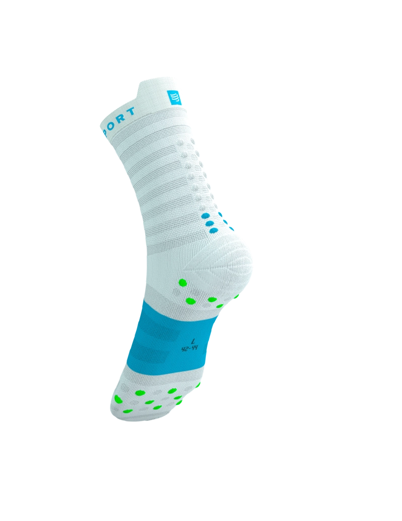 compressport pro racing ultralight run high quarter sock in light blue with touches os lime green and blue. rear side view.