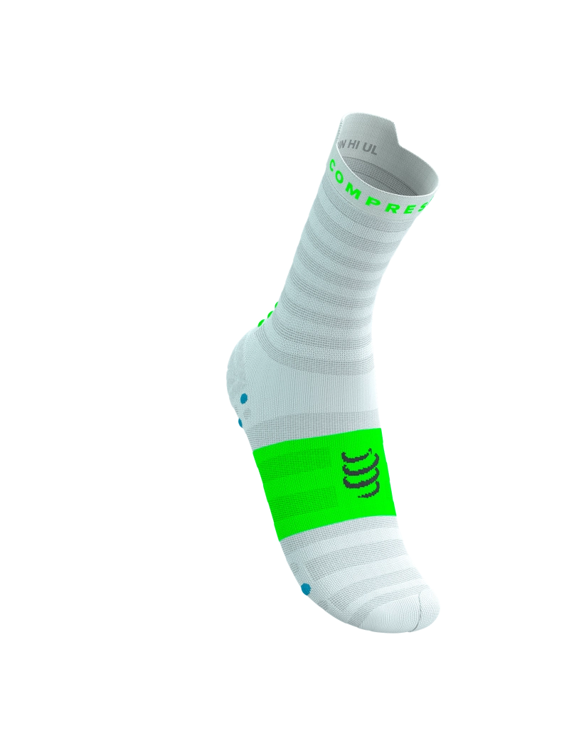 compressport pro racing ultralight run high quarter sock in light blue with touches os lime green and blue. front side view.