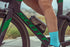 picture of profile design rz3 grey bottle and cage on a bike with a cyclist