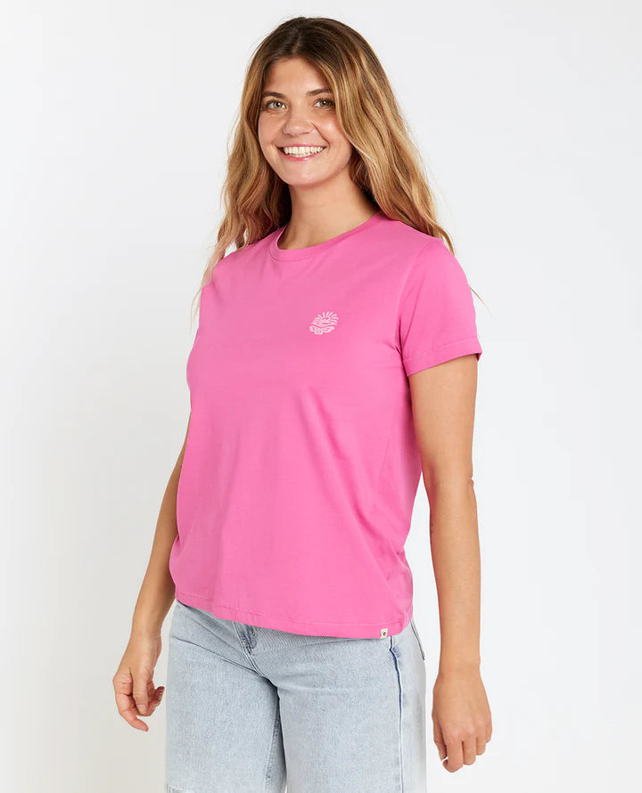 Woman wearing a rip curl pink t-shirt 
