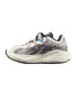 side view of salomon aero glide grvl 4 running shoes for women in vanilla ice colour