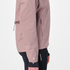 Woman wearing the salomon bonatti waterproof jacket, in antler colour, side view of zip pocket, reflective logo on sleeve