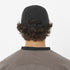 salomon s lab ultra cap, waterproof adjustable hat, black colour, man wearing salomon hat back view
