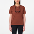 salomon shakeout core short sleeve running t-shirt for women, light and breathable run tee, dark burgundy colour with white salomon logo, model wearing salomon tee on white background with black leggings and sunglasses around her neck