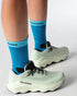 Light blue green salomon trail running shoe womens outside detail