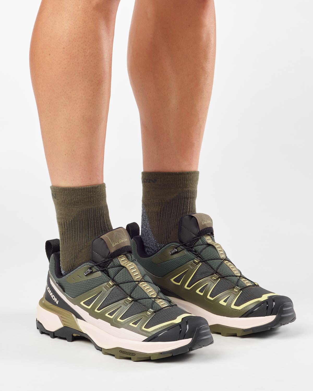 salomon x ultra 360 edge mens, gore-tex hiking shoe in the peat olive night endive colour. Side profile picture of shoe on a model.
