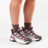 woman wearing salomon x ultra 360 edge gtx for women, waterproof hiking shoe with good grip, purple and grey colour