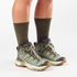 salomon x ultra 360 mid gore-tex womens hiking boots in the tea deep lichen  brunnera blue colourway. picture of shoes on a model