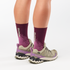 salomon xa pro 3d v9 gtx trail running and hiking shoe for women, waterproof salomon shoe, light green colour with olive green, purple and black details, close up of model wearing both shoes on a white background