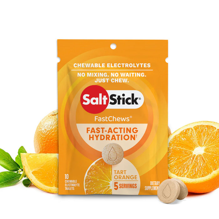 saltstick fastchews, chewable electrolyte tablets, a sachet of tart orange flavour saltstick fastchews on a white background with images of orange slices