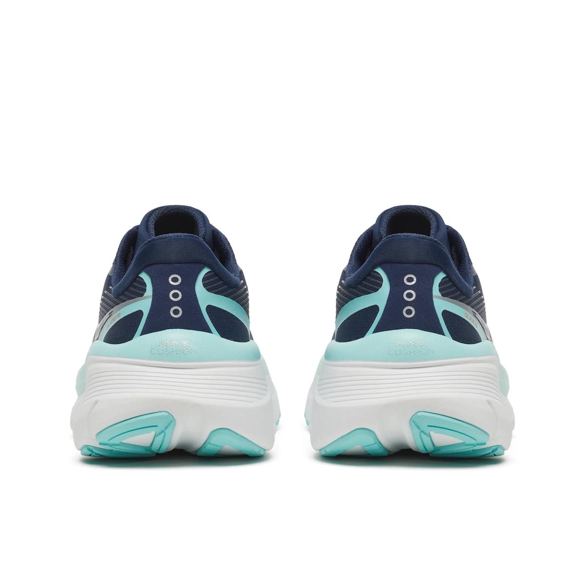 saucony guide 19 for women, supportive road running and walking shoe with good cushioning, navy and light blue with white sole, view of rear of shoes