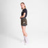 woman wearing saysky camo pace 2in1 run shorts for women with logo at front