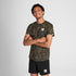 man wearing saysky camo running tee with logo on front