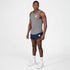 saysky clean combat pro singlet for men, lightweight tank for running or the gym, grey colour, full body profile of man wearing singlet with navy shorts on a white background