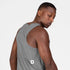 saysky clean combat pro singlet for men, lightweight tank for running or the gym, grey colour, back profile of man wearing singlet on a white background