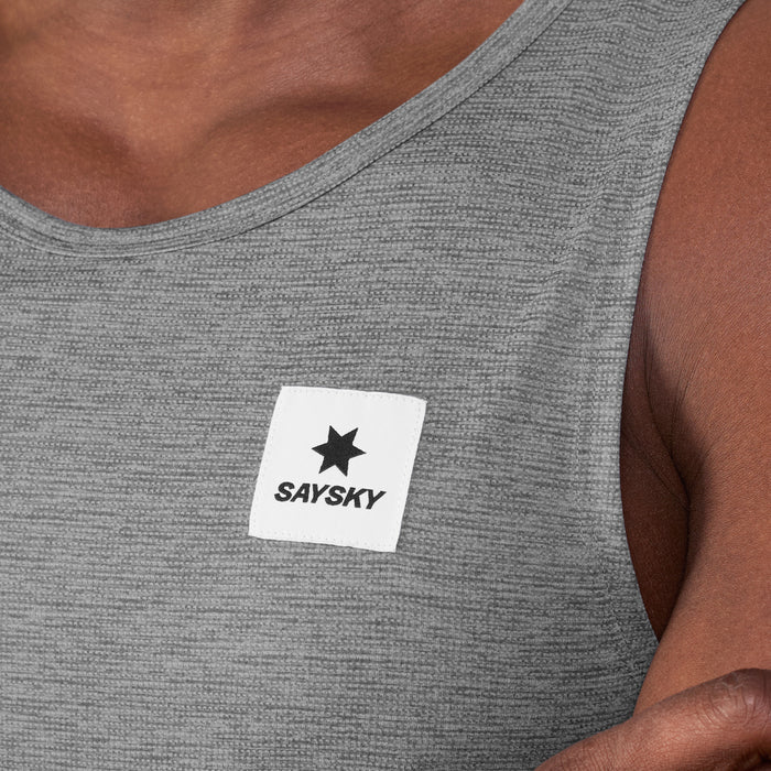 saysky clean combat pro singlet for men, lightweight tank for running or the gym, grey colour, close up of a man wearing singlet on  a white background