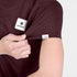 saysky clean combat pro t-shirt, lightweight running top for women, burgundy colour, close up of model wearing t-shirt on a white background