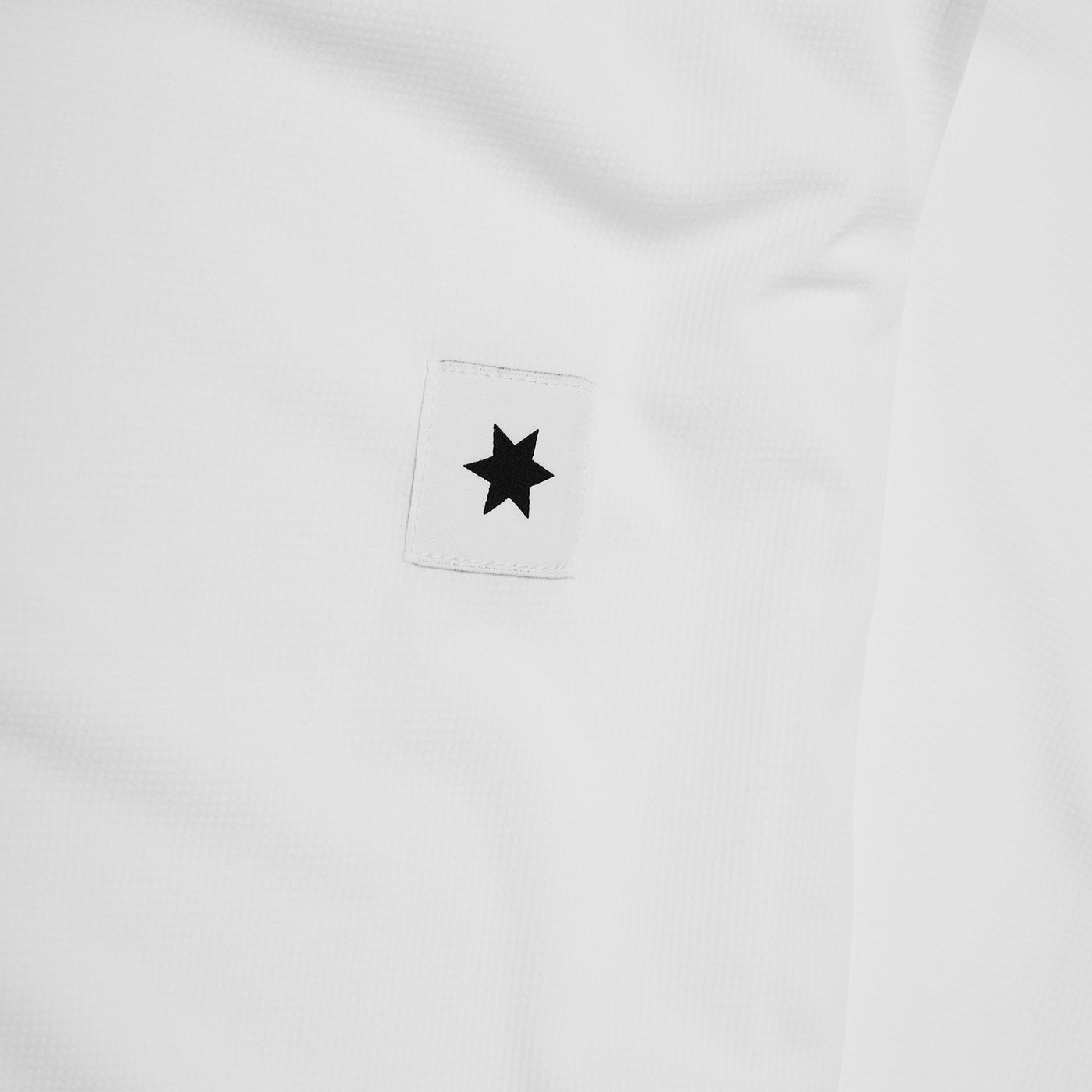 saysky clean combat tshirt for women closeup of logo