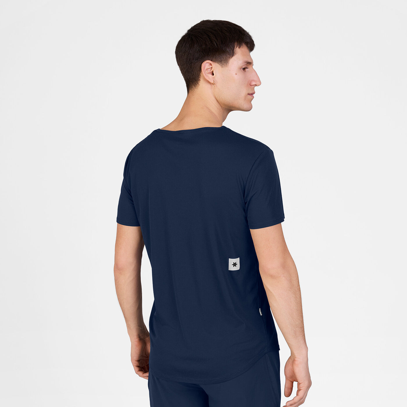 back view of mens saysky running t-shirt in a blue colour with a white saysky logo