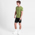 saysky short sleeve running t-shirt for men in navy blue, stretchy and quick-drying running tee, full body profile of man wearing saysky t-shirt and black shorts