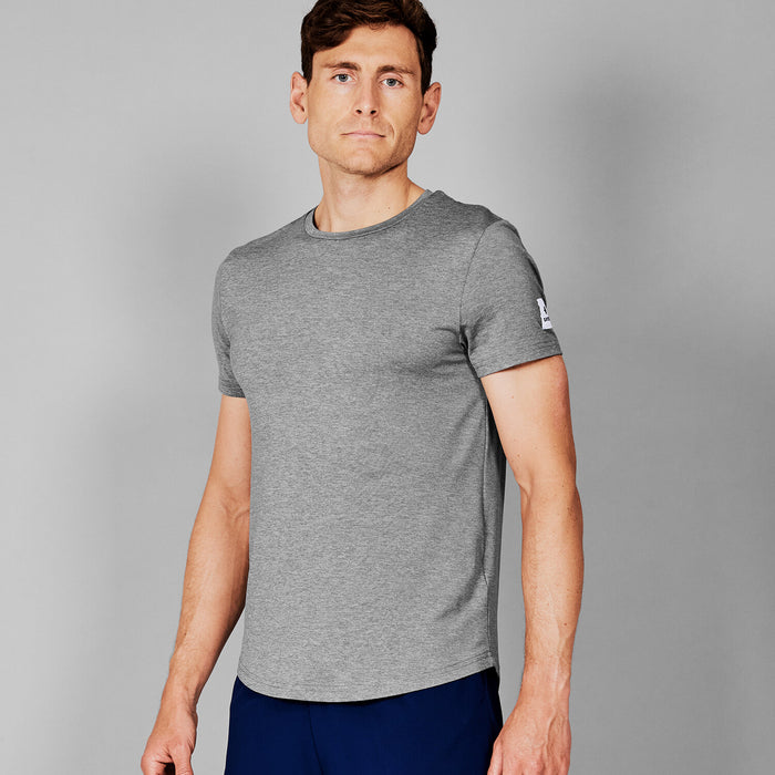 saysky short sleeve running t-shirt for men in grey, stretchy and quick-drying running tee, profile of man wearing saysky t-shirt