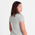 saysky clean pace tshirt for women, quick dry soft running tshirt, light grey colour, back view of woman wearing grey saysky running top 