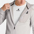 SAYSKY mens combat half zip fleece hoodie, warm and lightweight longsleeve fleece for running, grey colour with black SAYSKY logo, close up view of man wearing fleece with a white SAYSKY t-shirt underneath