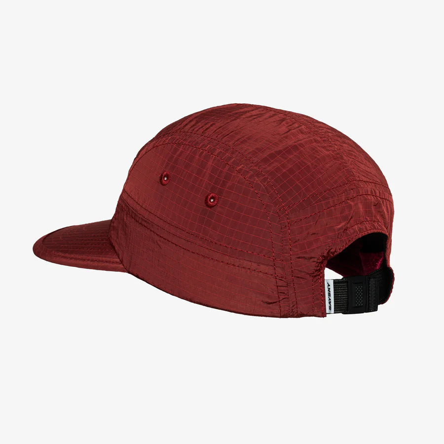 Red saysky cap with a black strap 