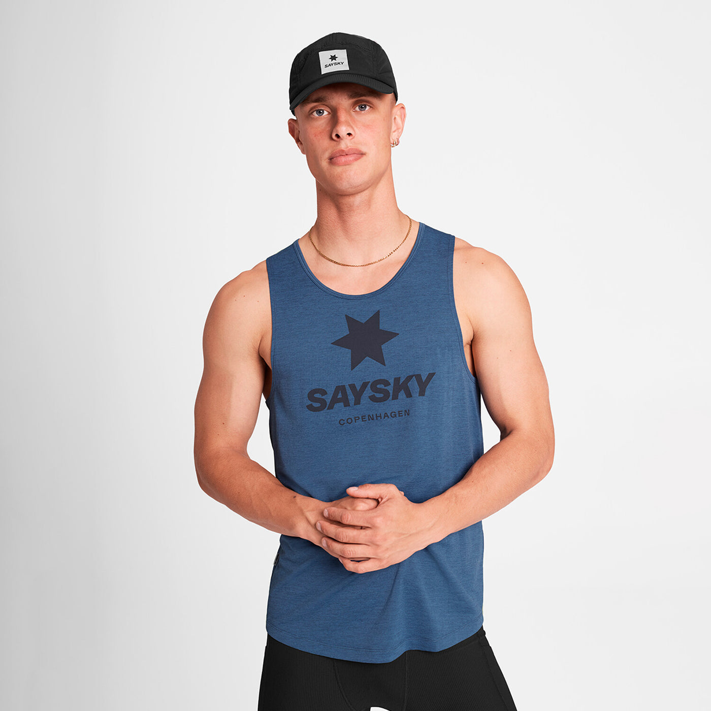 man wearing saysky logo combat pro singlet for men with logo printed on front