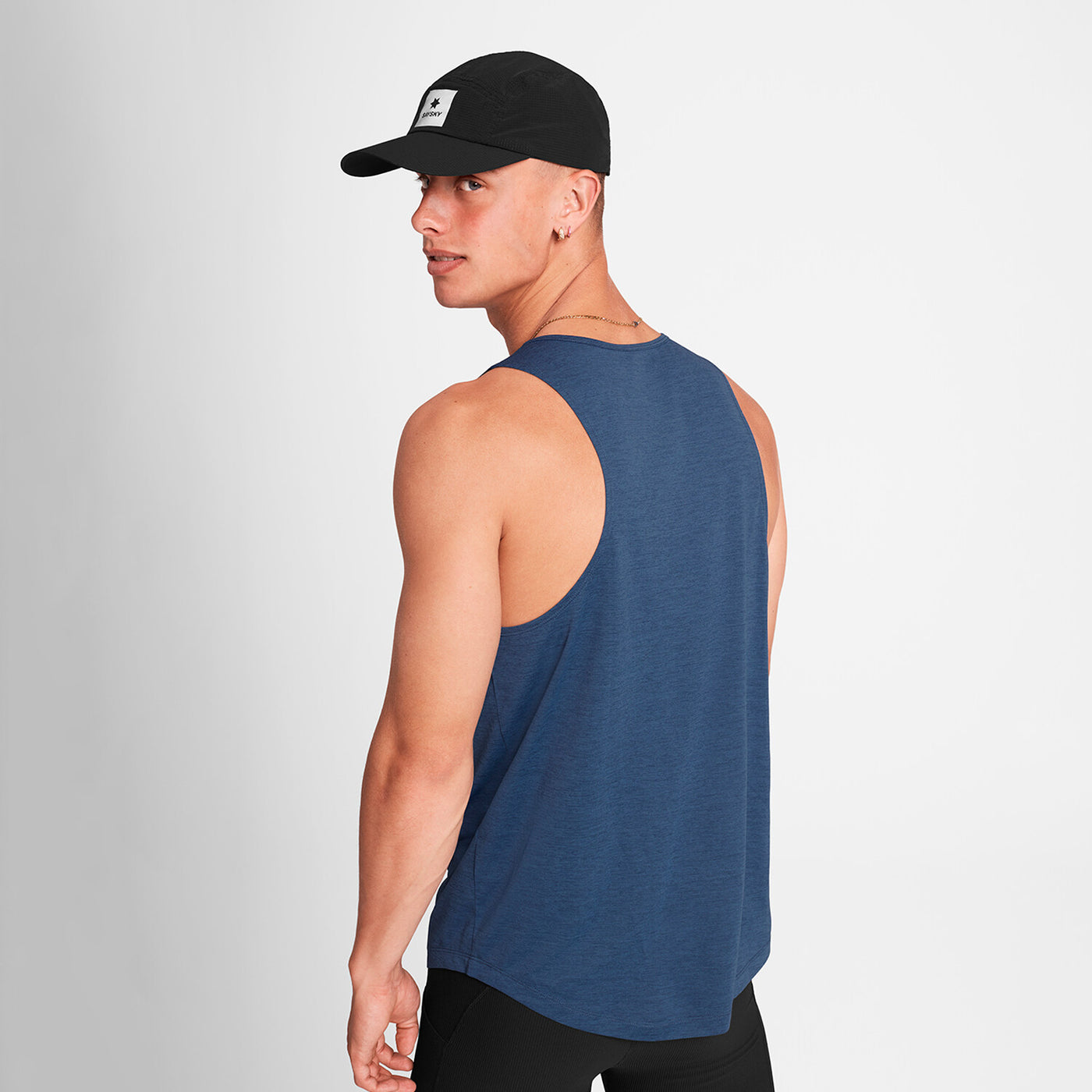man wearing saysky logo combat pro singlet for men showing back