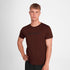 Man wearing SAYSKY logo pace t-shirt for running in red burgundy colour with logo on front