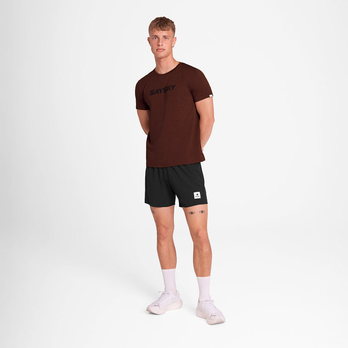 Man wearing SAYSKY logo pace t-shirt for running in red burgundy colour with logo on front