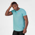 Man wearing a light blue SAYSKY running t-shirt with a small white logo on front chest