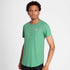 Man wearing a green SAYSKY running t-shirt with a small white logo on front chest