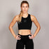 woman wearing saysky motion sports bra in black