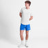 man wearing saysky pace 5 inch run shorts in blue colour with logo printed at front