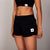saysky pace short 3 for women, running short with pockets and adjustable waist, black colour, woman wearing black saysky running shorts