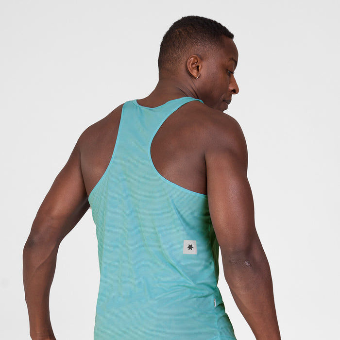mens light blue saysky singlet with reactive fabric that shows saysky pattern when wet, man wearing shirt with close up on back shoulders